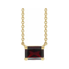 Minimalist 14K yellow gold Garnet birthstone necklace featuring a 5x3mm emerald-cut pendant.