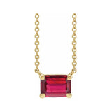 Minimalist 14K yellow gold Ruby birthstone necklace featuring a 5x3mm emerald-cut pendant. variant--Ruby variant--14K-yellow-gold