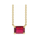 Minimalist 14K yellow gold Ruby birthstone necklace featuring a 5x3mm emerald-cut pendant.