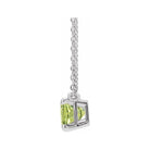 Minimalist birthstone necklace featuring a 5x3mm emerald-cut pendant.