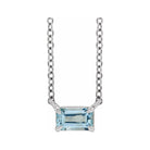 Minimalist Sterling silver Aquamarine birthstone necklace featuring a 5x3mm emerald-cut pendant.