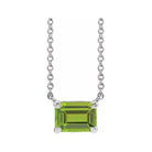 Minimalist Sterling silver Peridot birthstone necklace featuring a 5x3mm emerald-cut pendant.