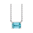 Minimalist Sterling silver Zircon birthstone necklace featuring a 5x3mm emerald-cut pendant.