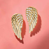 Angel wing diamond earrings in 14k gold