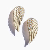Diamond angel wing stud earrings close up in 14K yellow gold