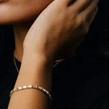 Modern baguette diamond bracelet with open bar setting