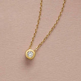 bezel diamond solitaire necklace in 14k gold