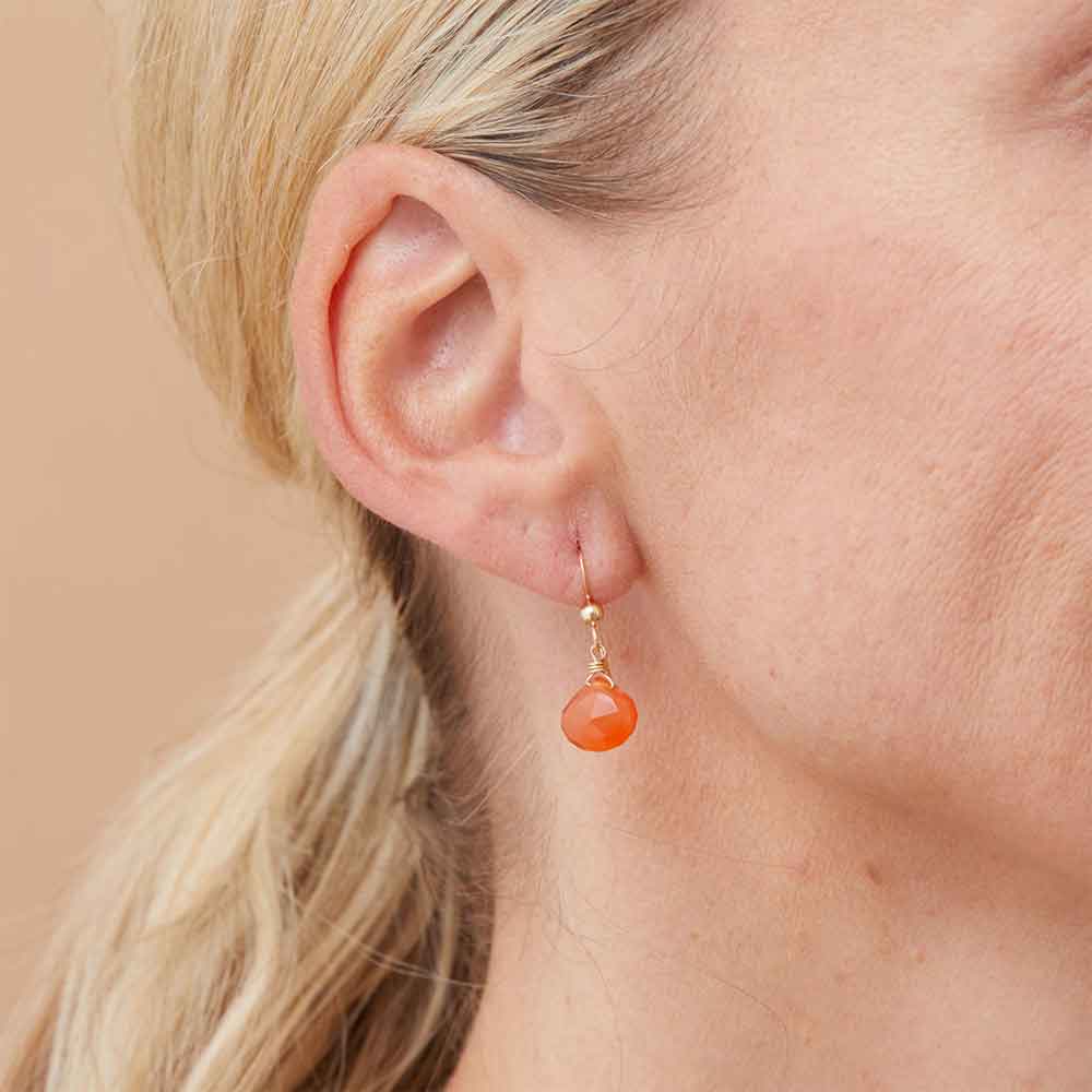 Custom gemstone drop earring in gold-fill, styled on model showing 1.5-inch drop length