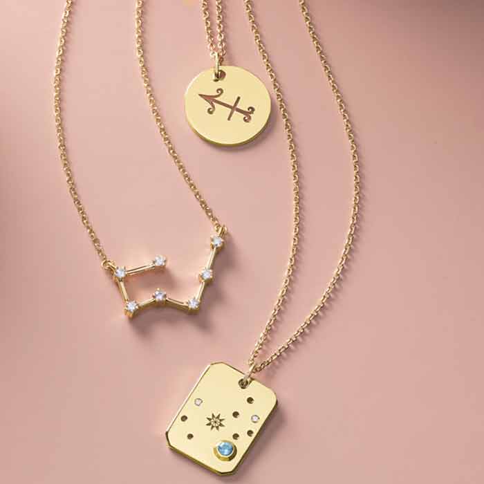 Constellation necklaces in gold styled for the perfect gift
