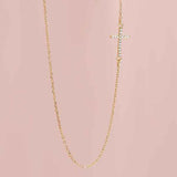 Diamond sideways cross pendant necklace in 14K yellow gold
