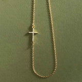 Delicate horizontal diamond cross necklace on cable chain