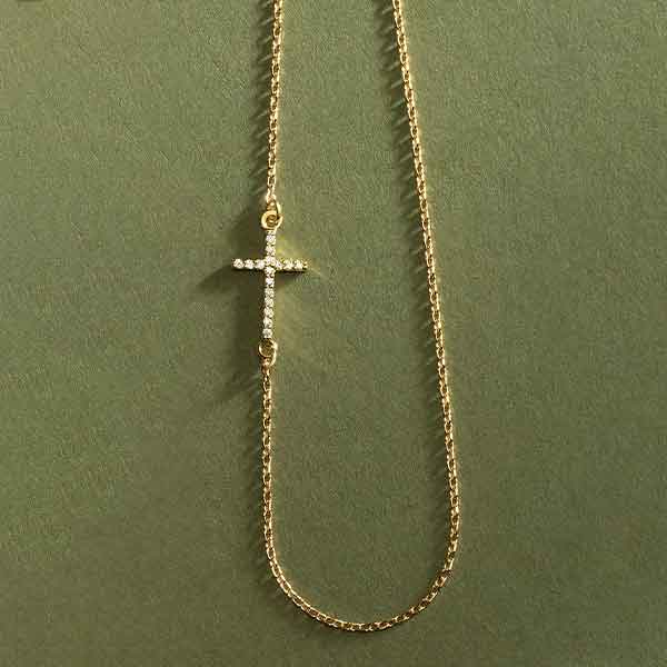 Delicate horizontal diamond cross necklace on cable chain