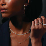 Lab-grown diamond tennis necklace in recycled gold on model