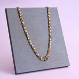 Close-up of Elysian shaker chain links in 14K gold-fill, USA handcrafted