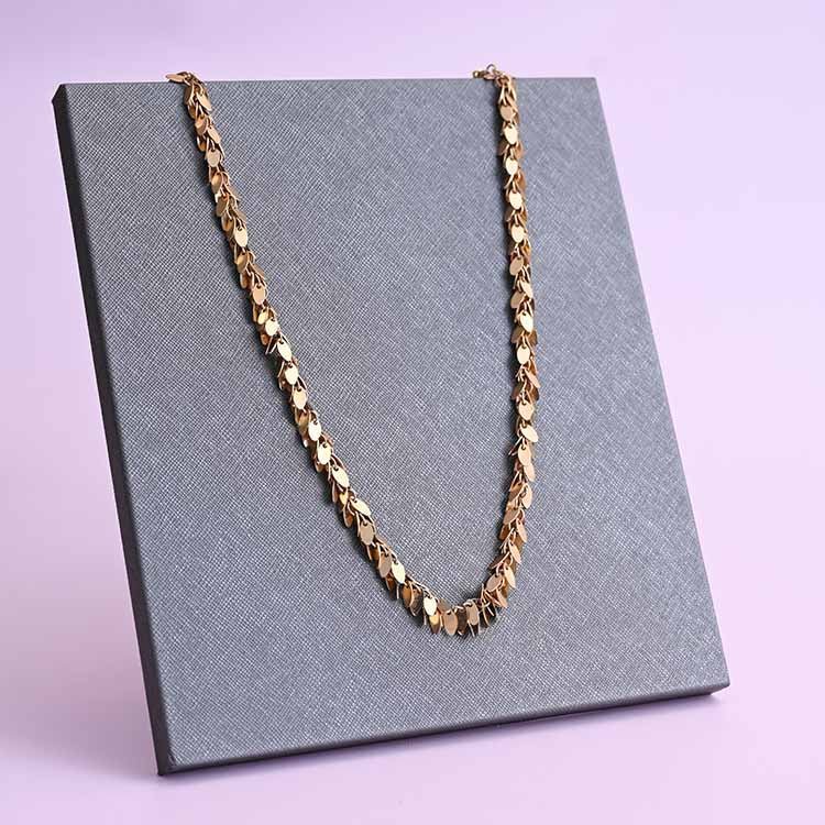 Close-up of Elysian shaker chain links in 14K gold-fill, USA handcrafted