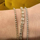 6.25 carat emerald-cut lab-grown diamond tennis bracelet worn on wrist