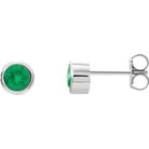 Lab-created emerald earrings symbolizing love and renewal