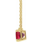 ruby baguette side view yellow gold