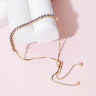 Natural sapphire tennis bracelet in 14K gold with adjustable chain